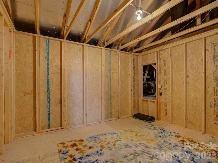 521 Trillium Way, Belmont, NC 28012.  MLS# CAR4314803, YatesRealty ID 6944. Unfinished storage room on second floor