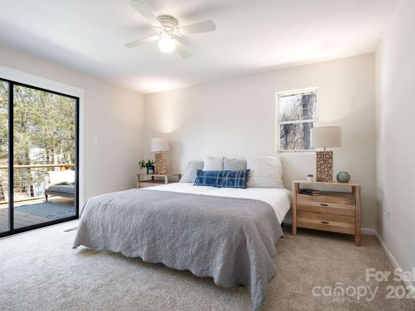 29 Evelake Drive, Asheville, NC 28806.  MLS# CAR4215759, YatesRealty ID 6945. Primary Bedroom has New Carpet and Private Deck
