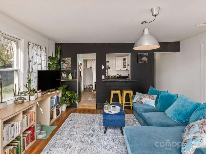 21 Hilldale Road, Asheville, NC 28803.  MLS# CAR4240951, YatesRealty ID 6951. Living Room Looking Toward Kitchen