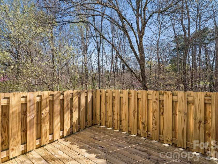 655 Lex Drive, Charlotte, NC 28262.  MLS# CAR4359903, YatesRealty ID 6951. Back deck off main floor
