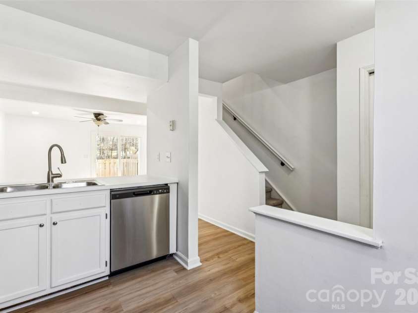 655 Lex Drive, Charlotte, NC 28262.  MLS# CAR4359903, YatesRealty ID 6951. Kitchen overlooking Living and Dining area