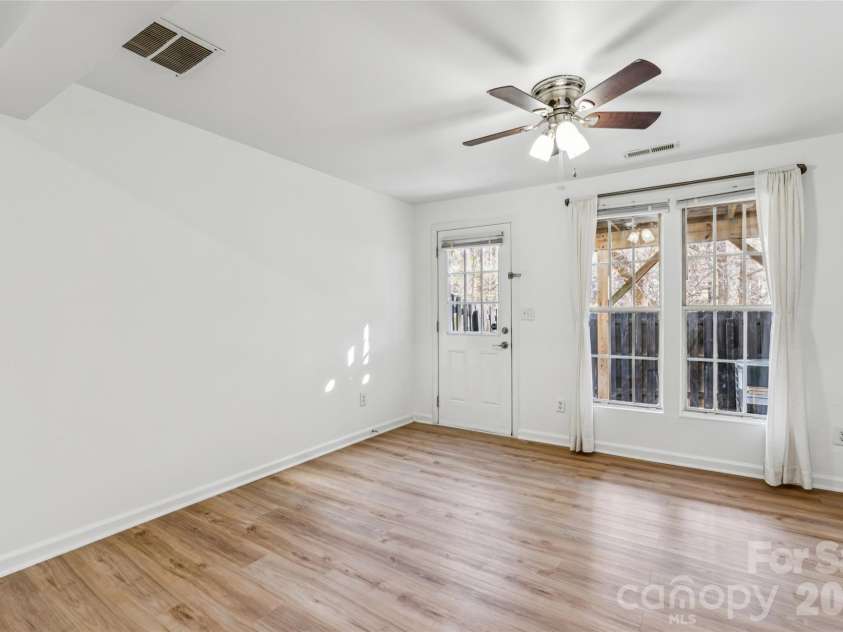 655 Lex Drive, Charlotte, NC 28262.  MLS# CAR4359903, YatesRealty ID 6951. Primary bedroom located in the basement with outside access 