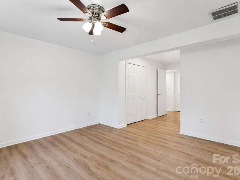 655 Lex Drive, Charlotte, NC 28262.  MLS# CAR4359903, YatesRealty ID 6951. Primary bedroom with closet and full bathroom 