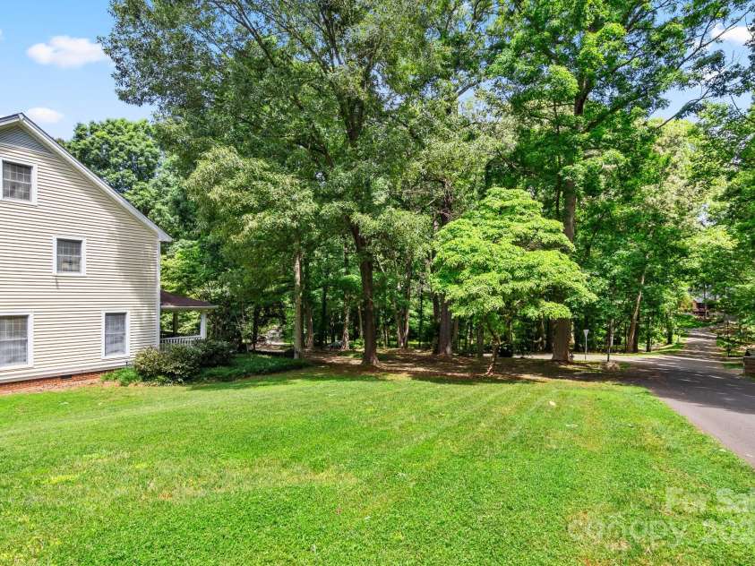 205 Vauxhall Drive, Shelby, NC 28150.  MLS# CAR4131707, YatesRealty ID 696. Side yard