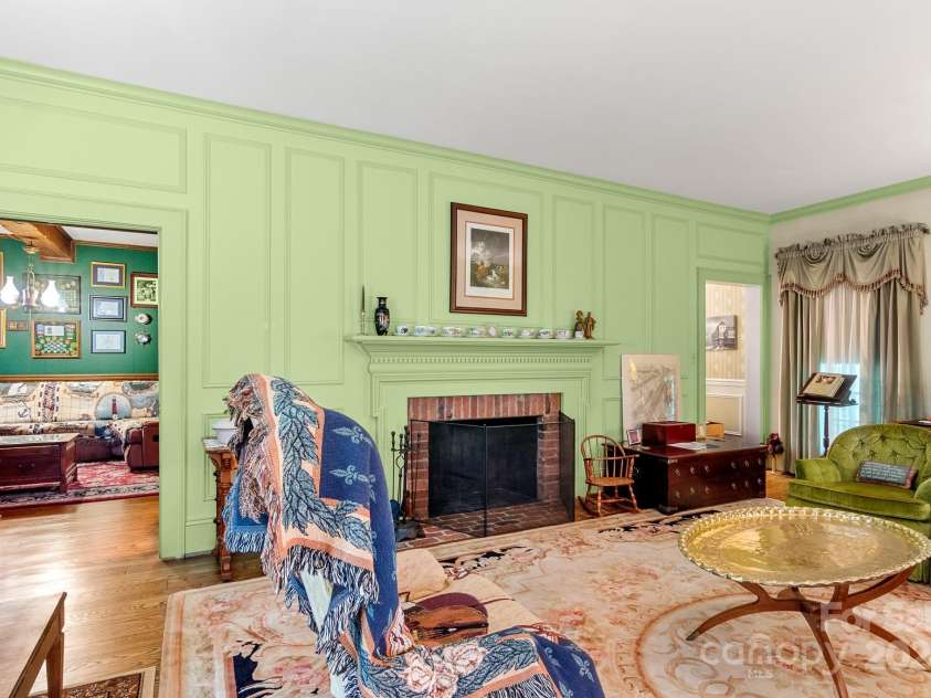 205 Vauxhall Drive, Shelby, NC 28150.  MLS# CAR4131707, YatesRealty ID 696. The spacious living room is centered around a fireplace