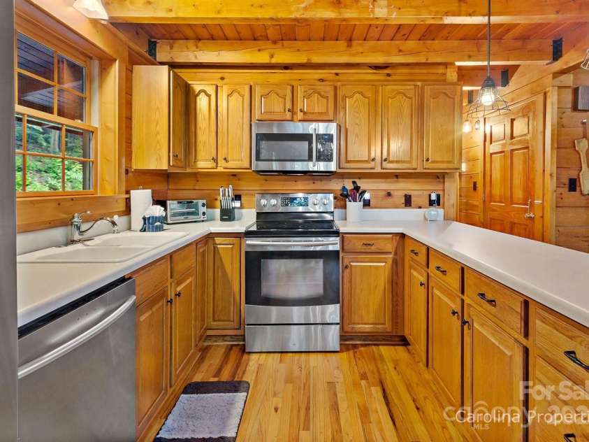 501 Bolt Road, Lake Lure, NC 28746.  MLS# CAR4241628, YatesRealty ID 6962. Functional kitchen with all the necessities