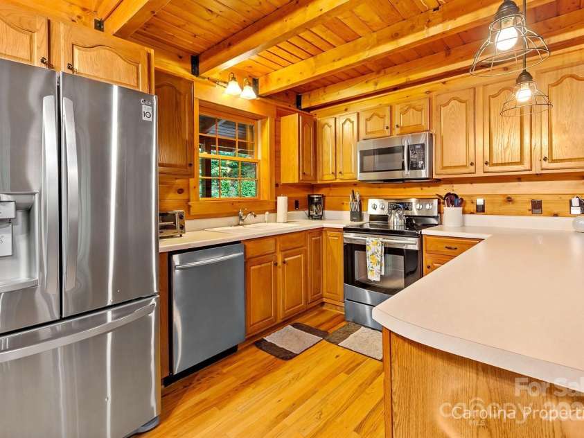 501 Bolt Road, Lake Lure, NC 28746.  MLS# CAR4241628, YatesRealty ID 6962. Functional kitchen with all the necessities