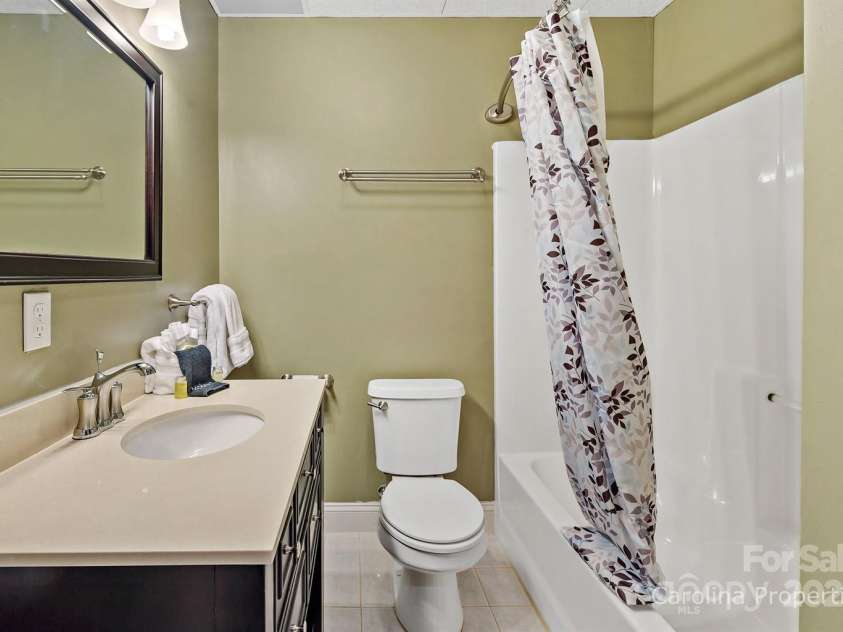 501 Bolt Road, Lake Lure, NC 28746.  MLS# CAR4241628, YatesRealty ID 6962. Lower-level full bath