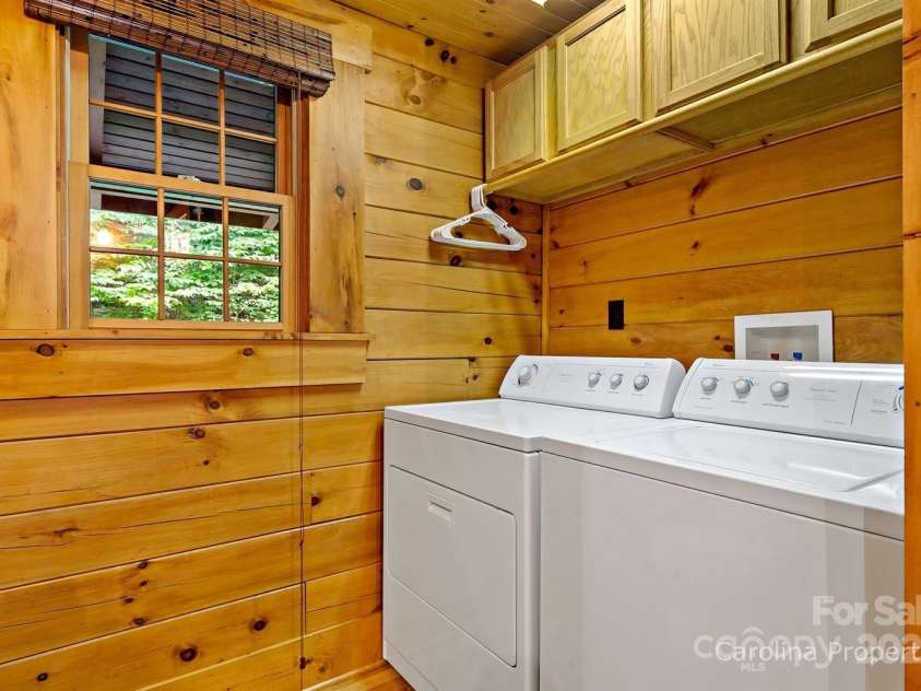501 Bolt Road, Lake Lure, NC 28746.  MLS# CAR4241628, YatesRealty ID 6962. Main level laundry area