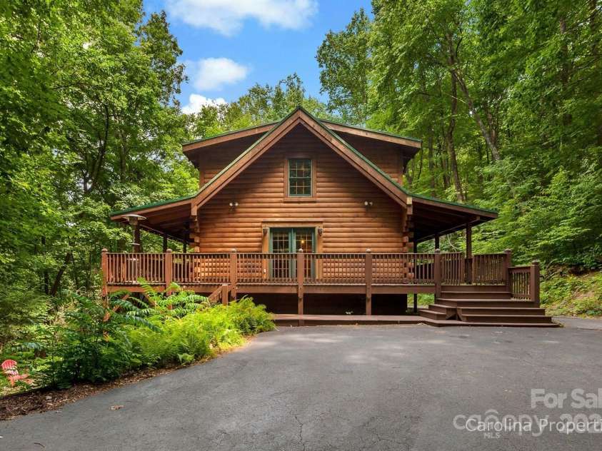501 Bolt Road, Lake Lure, NC 28746.  MLS# CAR4241628, YatesRealty ID 6962. Palms to Pines Vacation Rental or can be a private residence.