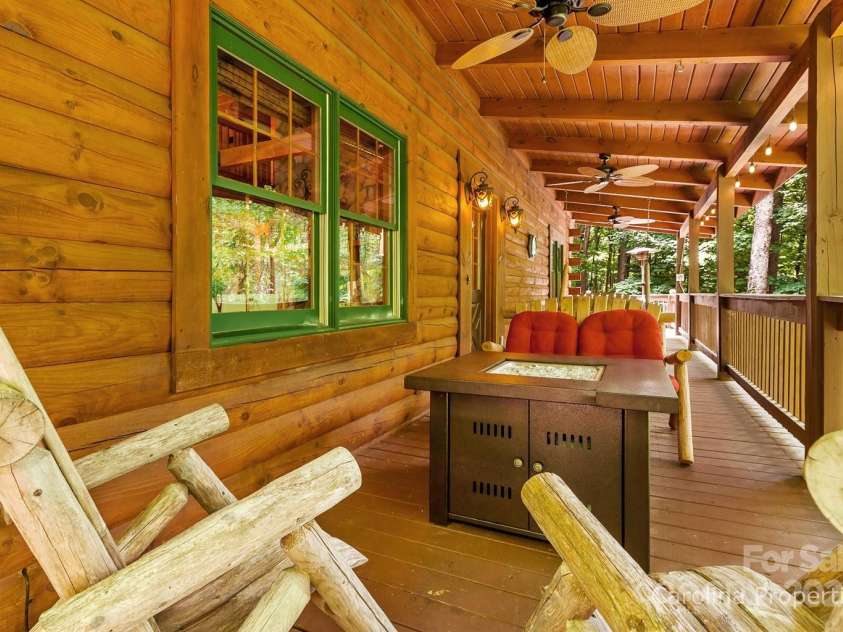 501 Bolt Road, Lake Lure, NC 28746.  MLS# CAR4241628, YatesRealty ID 6962. Relax with the gas fire-pit