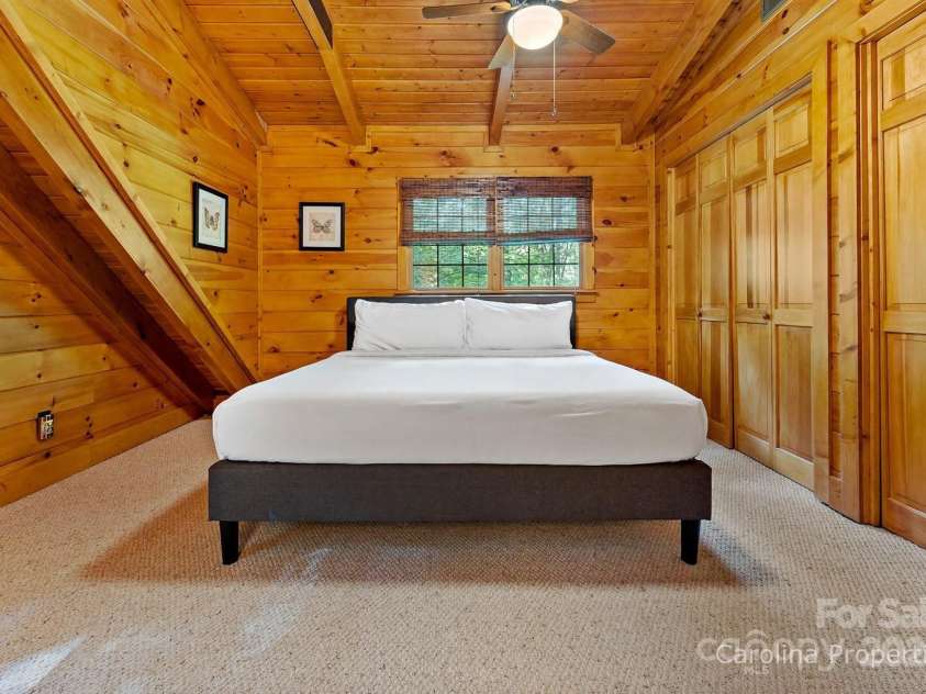 501 Bolt Road, Lake Lure, NC 28746.  MLS# CAR4241628, YatesRealty ID 6962. Upper-level bedroom