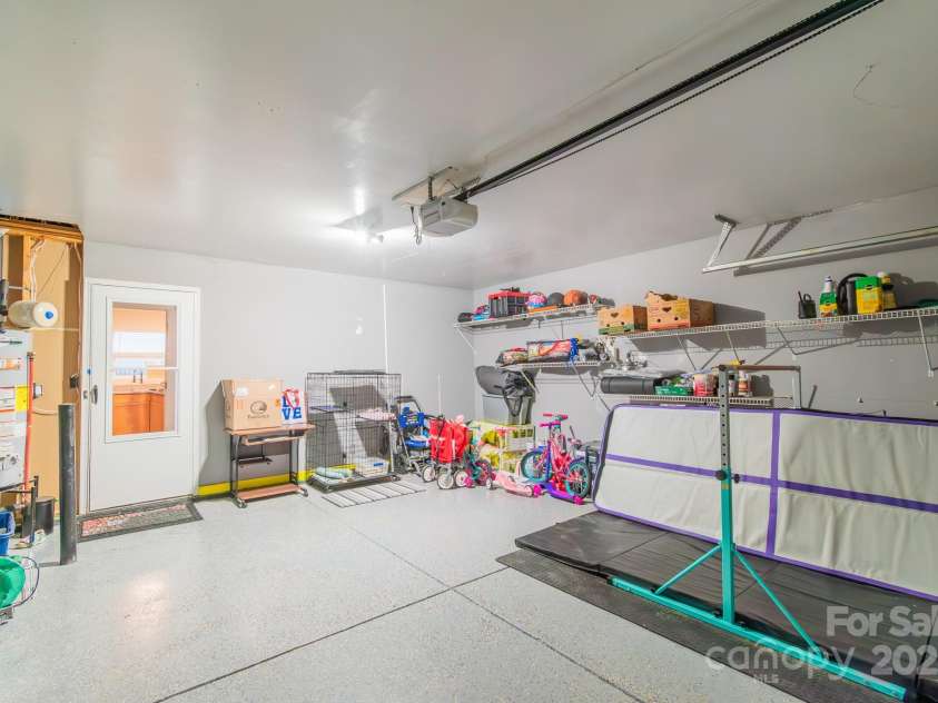 552 Montgomery Drive, Rock Hill, SC 29732.  MLS# CAR4233355, YatesRealty ID 6964. Garage with shelves and epoxy flooring