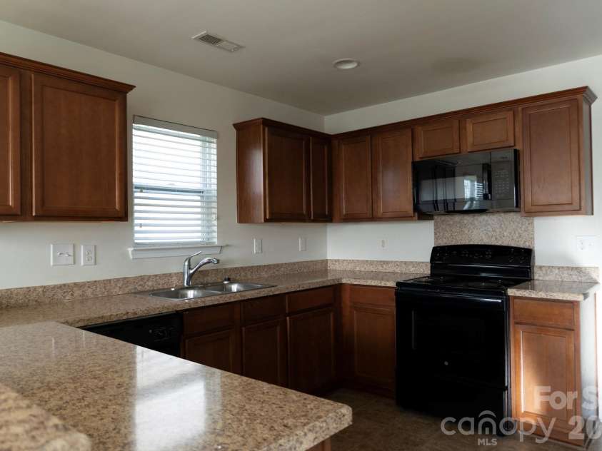 3244 Oulten Street, Concord, NC 28027.  MLS# CAR4362865, YatesRealty ID 6969. Kitchen