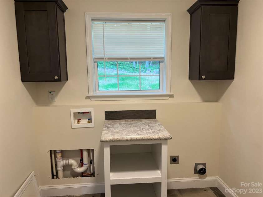 5716 Dalmatian Street, Iron Station, NC 28080.  MLS# CAR4024125, YatesRealty ID 697. Laundry