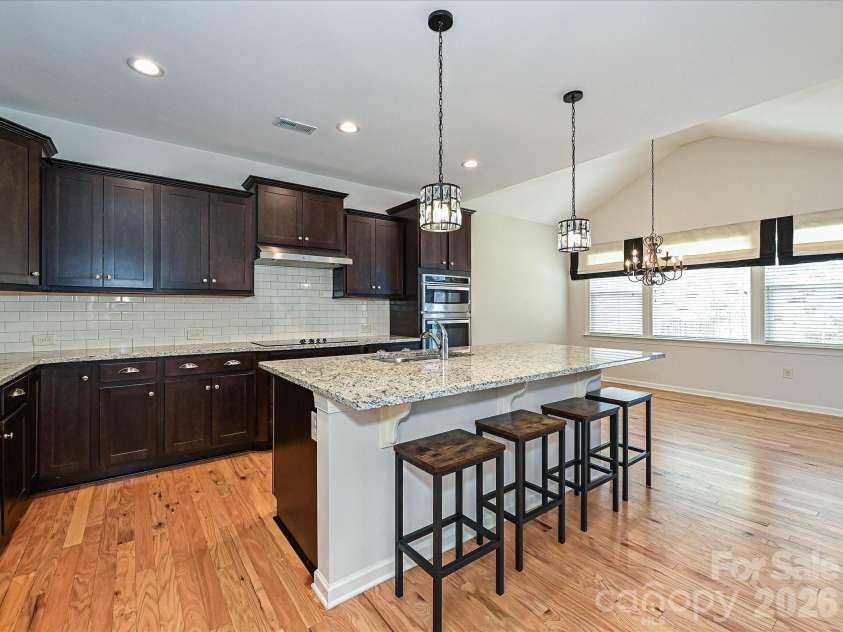 2004 Rockbrook Lane, Belmont, NC 28012.  MLS# CAR4355401, YatesRealty ID 6972. Chef's Kitchen with spacious Island & adjoining breakfast room