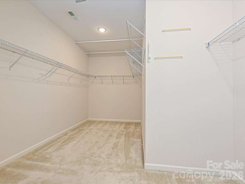 2004 Rockbrook Lane, Belmont, NC 28012.  MLS# CAR4355401, YatesRealty ID 6972. Primary Bedroom 'walk-in-closet'