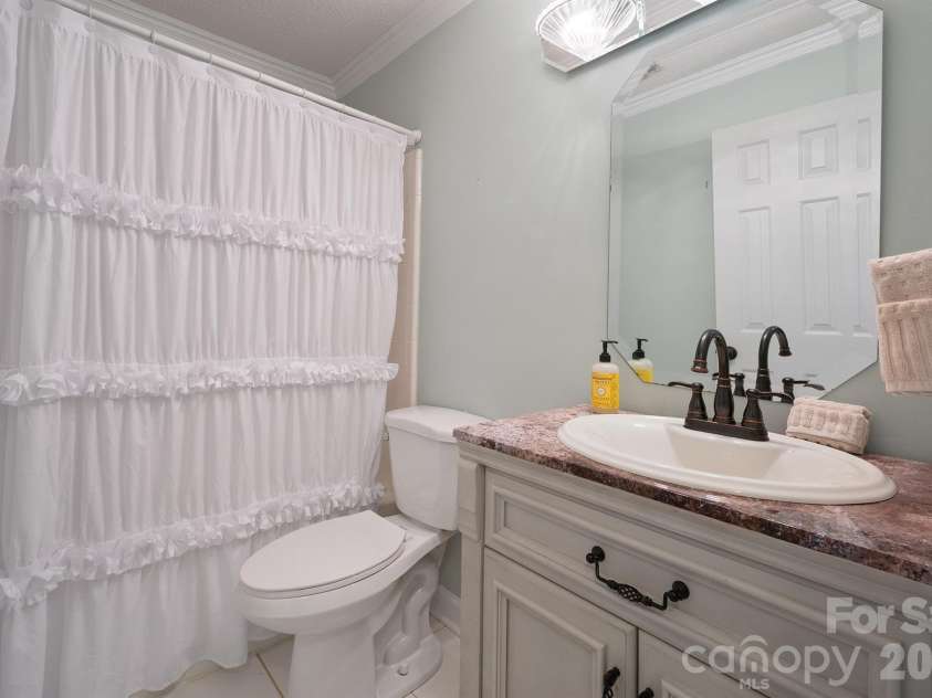 5805 Amity Springs Drive, Charlotte, NC 28212.  MLS# CAR4357438, YatesRealty ID 6974. Full second bathroom