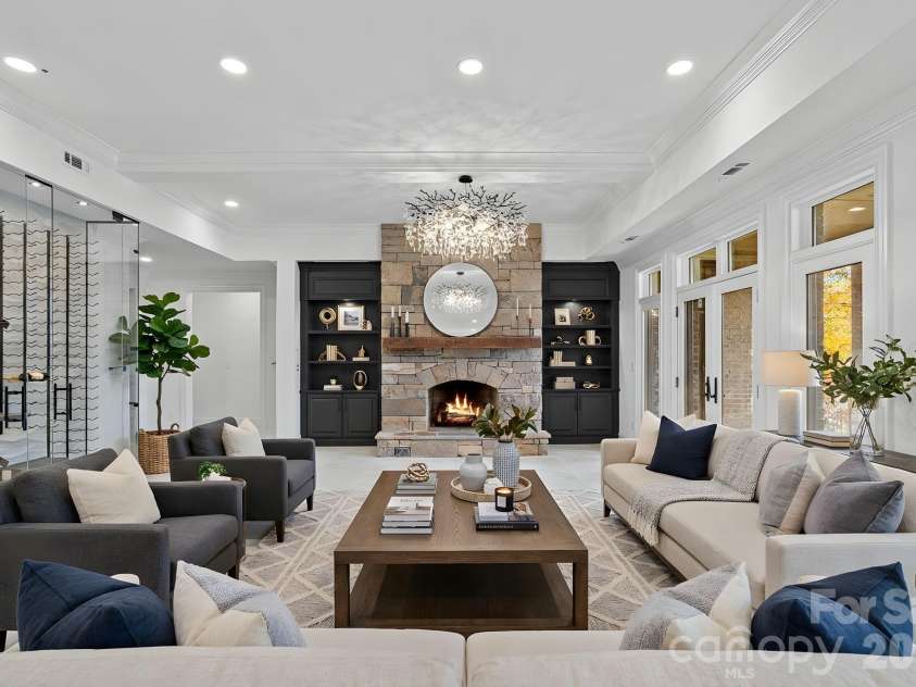 16624 Flying Jib Road, Cornelius, NC 28031.  MLS# CAR4320986, YatesRealty ID 6977. Lake level family room. virtually staged