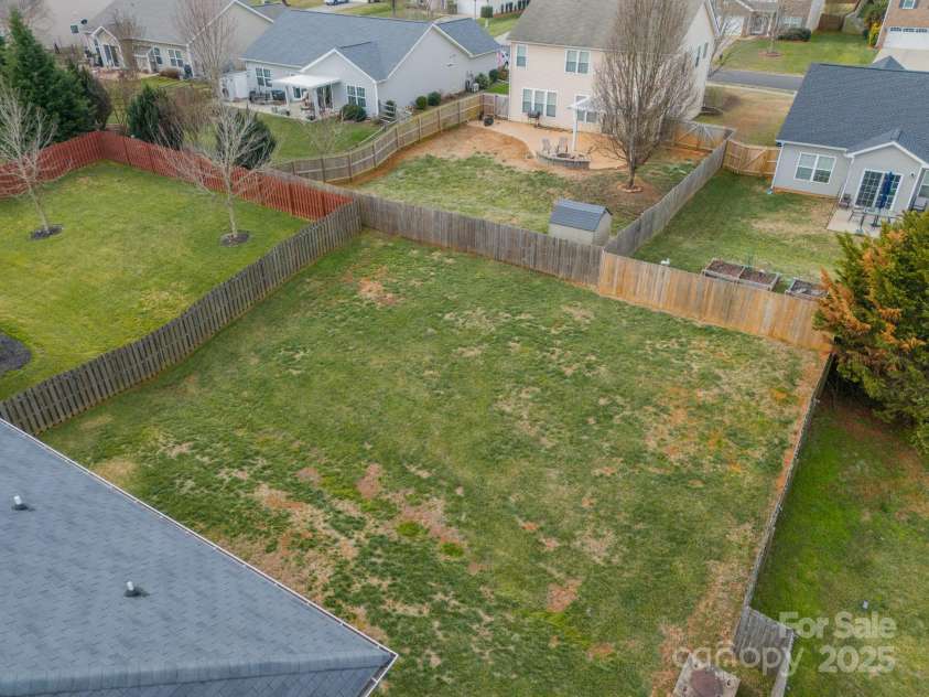 2131 Ashley Glen Way, Fort Mill, SC 29707.  MLS# CAR4217689, YatesRealty ID 6977. Backyard