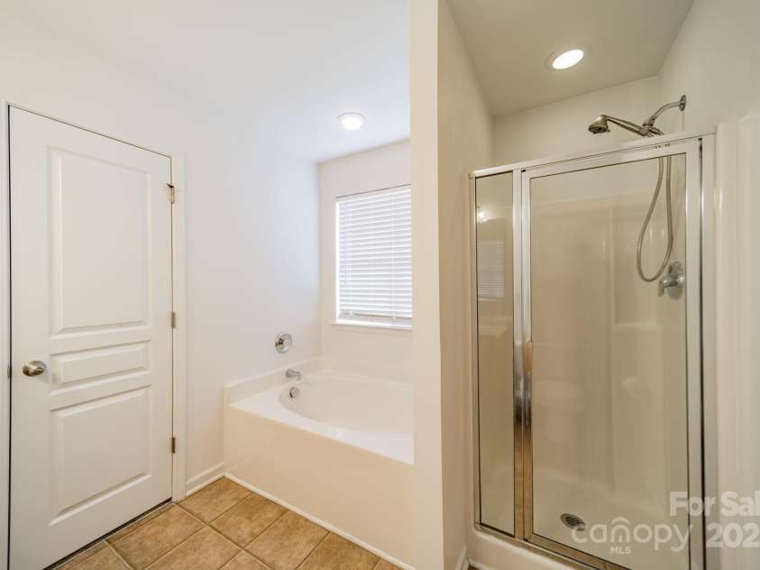 2131 Ashley Glen Way, Fort Mill, SC 29707.  MLS# CAR4217689, YatesRealty ID 6977. Primary Bathroom