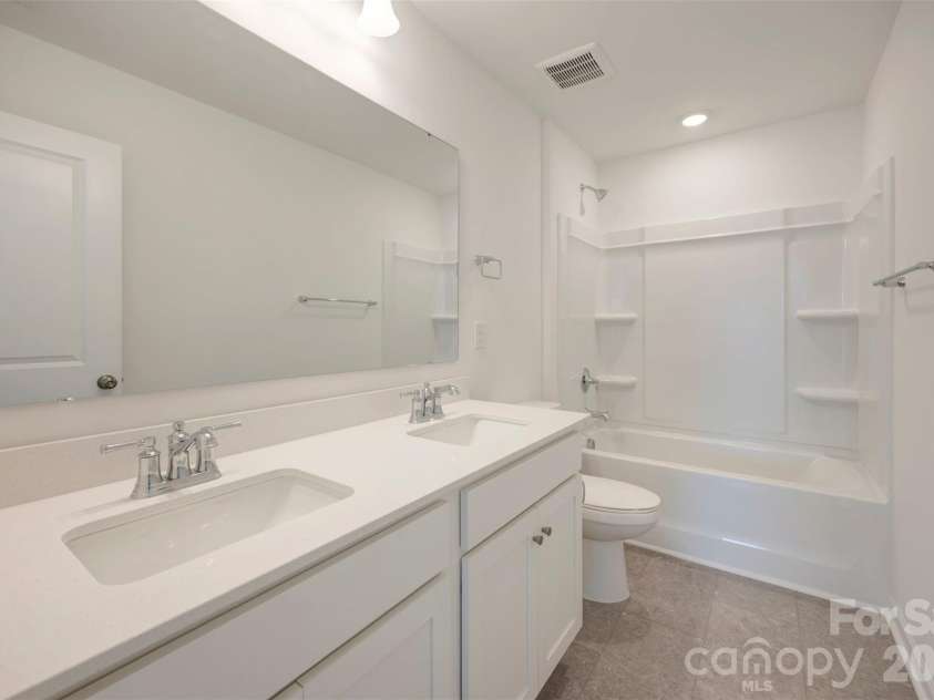 1853 Augustine Street, Monroe, NC 28112.  MLS# CAR4351642, YatesRealty ID 6978. Secondary bathroom