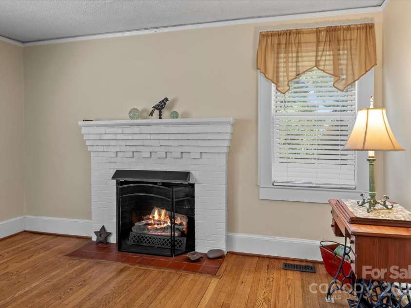 10633 Hwy 52 Highway, Rockwell, NC 28138.  MLS# CAR4233308, YatesRealty ID 6979. Cozy gas fireplace in family room perfect for cozy conversations and warmth on winter nights.