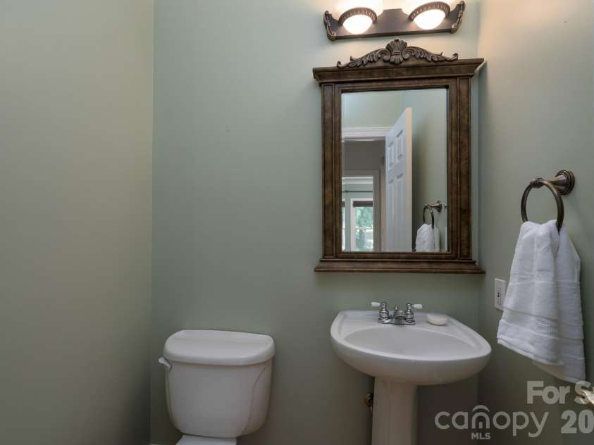 103 Berea Baptist Church Road, Stanfield, NC 28163.  MLS# CAR4195487, YatesRealty ID 6982. Half bath in hall main level