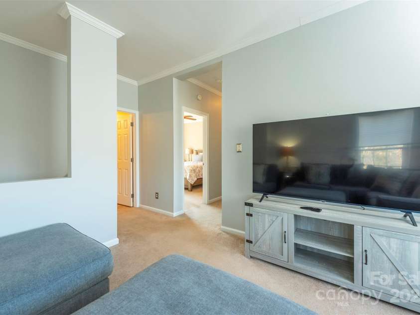 192 Buzzards Place, Lake Lure, NC 28746.  MLS# CAR4235753, YatesRealty ID 6985. 2nd floor Family Room