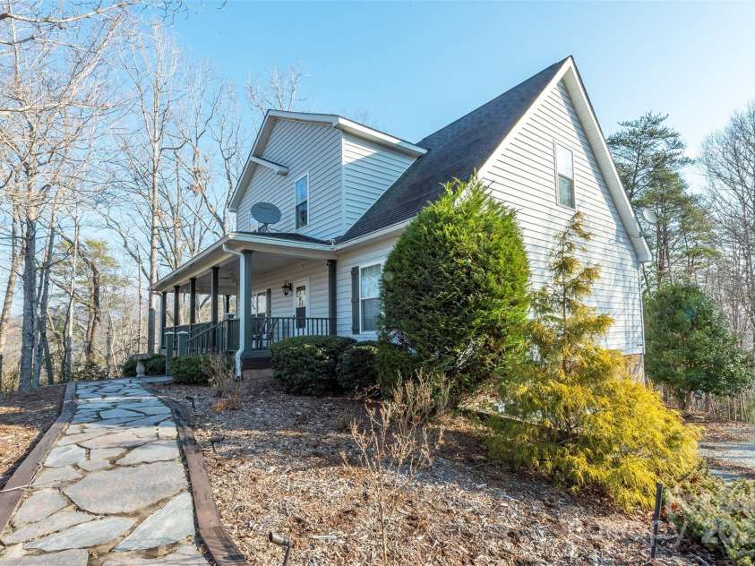 192 Buzzards Place, Lake Lure, NC 28746.  MLS# CAR4235753, YatesRealty ID 6985. Side view of House