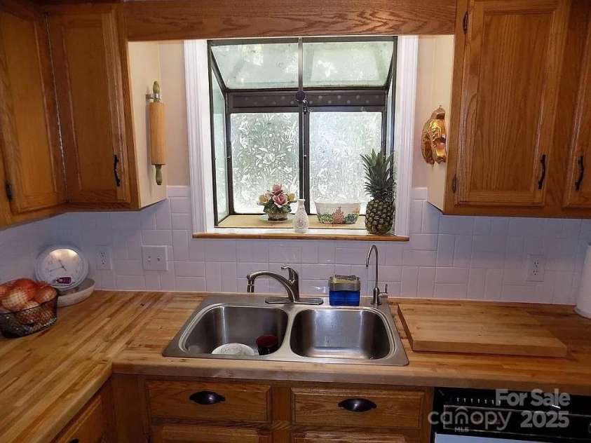 4122 Connestee Trail, Brevard, NC 28712.  MLS# CAR4249240, YatesRealty ID 6988. 