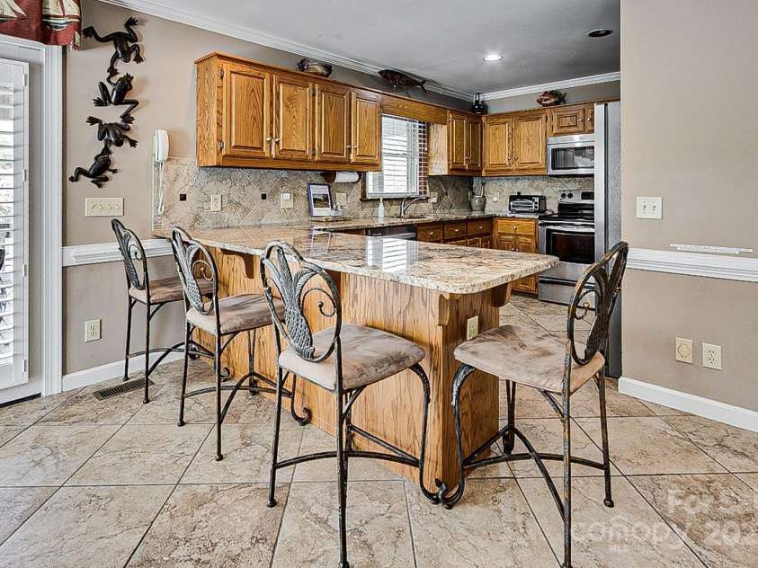 378 Shoreline Drive, New London, NC 28127.  MLS# CAR4246898, YatesRealty ID 6989. 