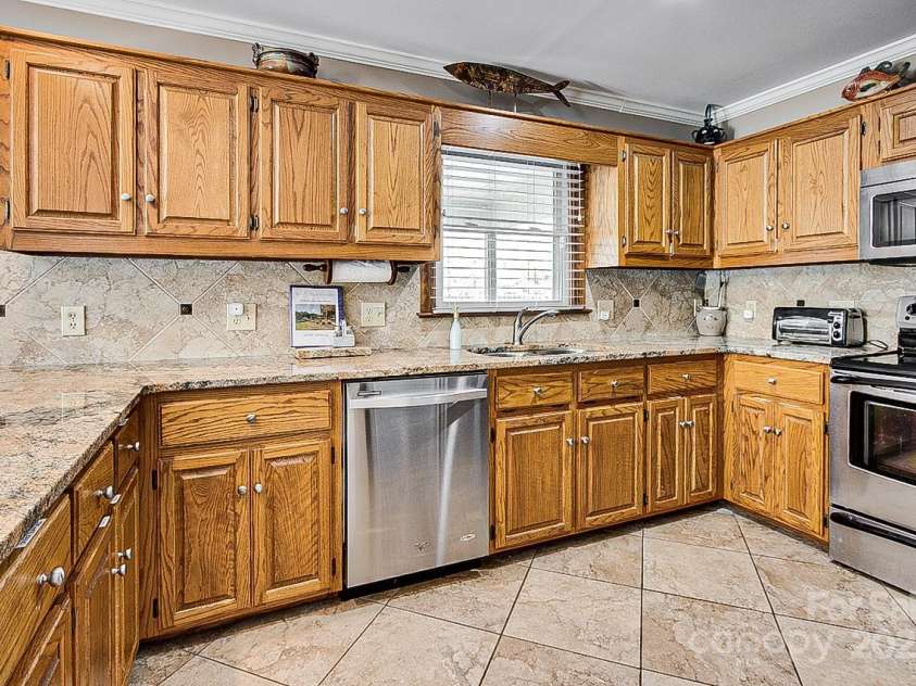 378 Shoreline Drive, New London, NC 28127.  MLS# CAR4246898, YatesRealty ID 6989. 