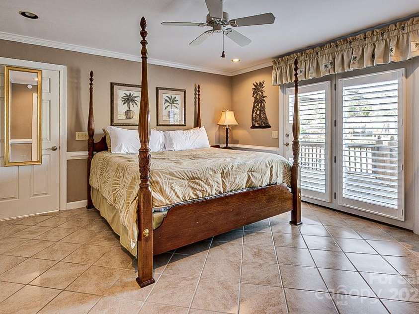 378 Shoreline Drive, New London, NC 28127.  MLS# CAR4246898, YatesRealty ID 6989. Primary bedroom on main floor