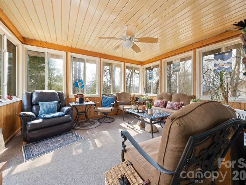 109 Eagle Rock Trail, Hendersonville, NC 28739.  MLS# CAR4353116, YatesRealty ID 6993. Year round sun room
