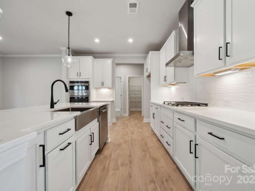 404 Balboa Street, Matthews, NC 28104.  MLS# CAR4249472, YatesRealty ID 6996. Example Photo