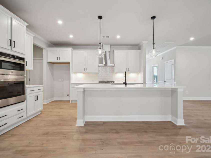 404 Balboa Street, Matthews, NC 28104.  MLS# CAR4249472, YatesRealty ID 6996. Example Photo