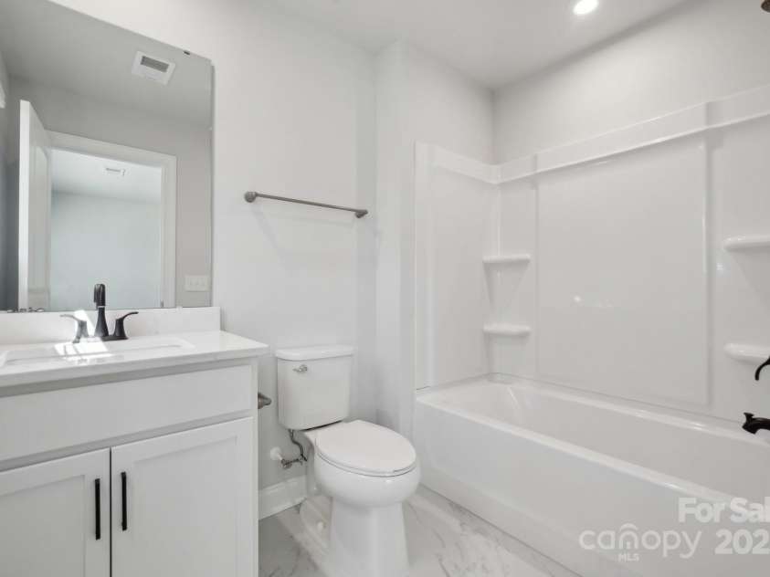 404 Balboa Street, Matthews, NC 28104.  MLS# CAR4249472, YatesRealty ID 6996. Example Photo