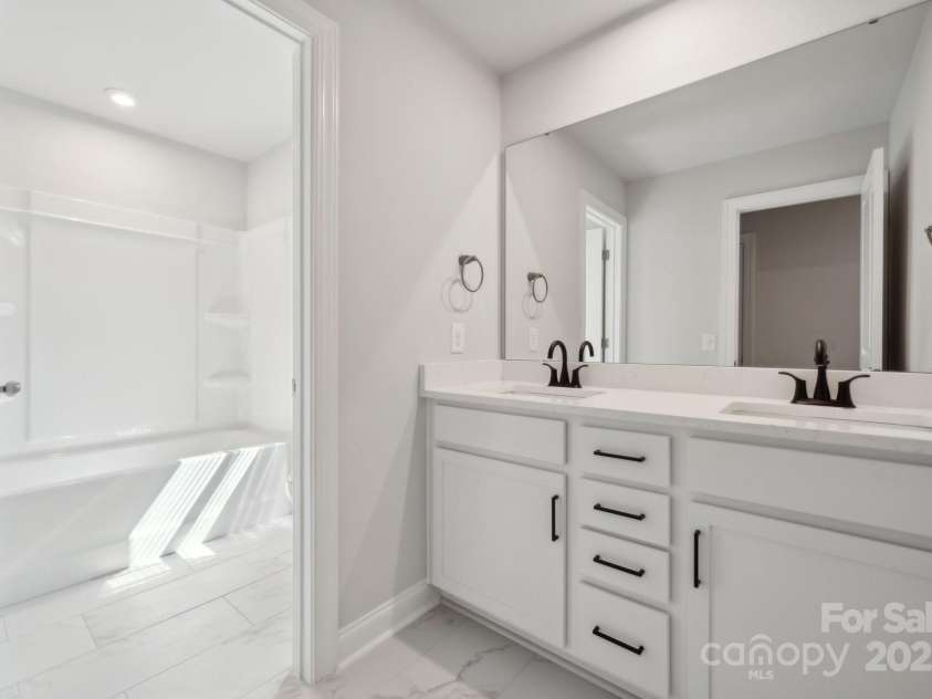 404 Balboa Street, Matthews, NC 28104.  MLS# CAR4249472, YatesRealty ID 6996. Example Photo