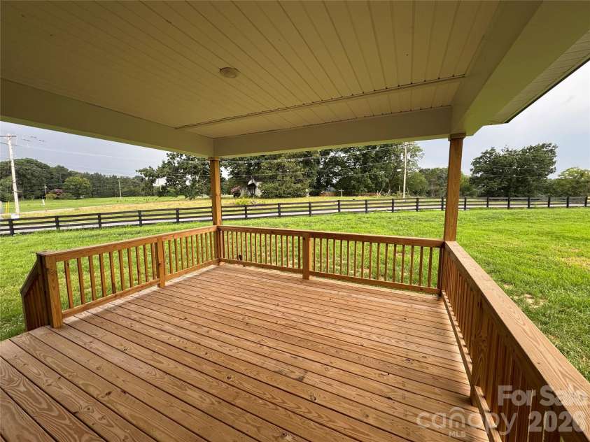 140 Swan Park Lane, Statesville, NC 28625.  MLS# CAR4342903, YatesRealty ID 6997. Oversized covered deck