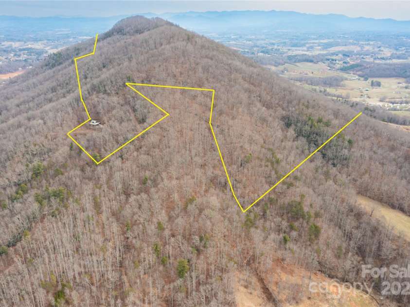 298 Turkey Creek Road, Leicester, NC 28748.  MLS# CAR4112849, YatesRealty ID 700. Aerial Image with Approx Property Lines