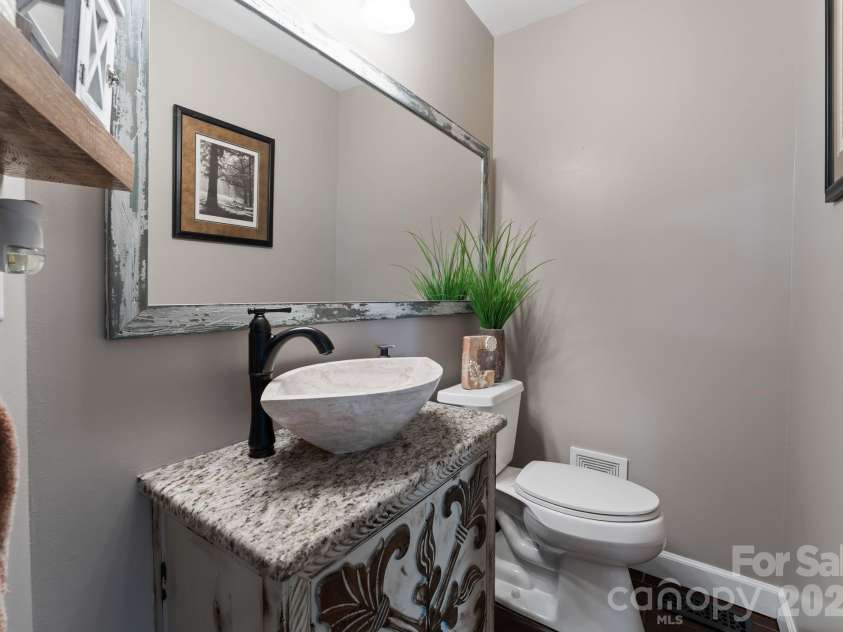 20732 Eastpoint Drive, Cornelius, NC 28031.  MLS# CAR4340192, YatesRealty ID 7002. Downstairs Half Bathroom 