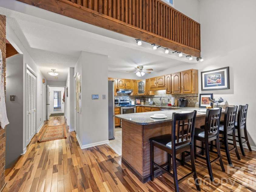 501 Woodfield Drive, Asheville, NC 28803.  MLS# CAR4342330, YatesRealty ID 7007. Architecturally integrated bar seating
