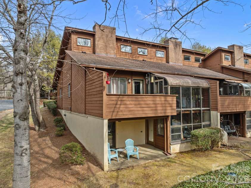 501 Woodfield Drive, Asheville, NC 28803.  MLS# CAR4342330, YatesRealty ID 7007. Coveted Corner Unit