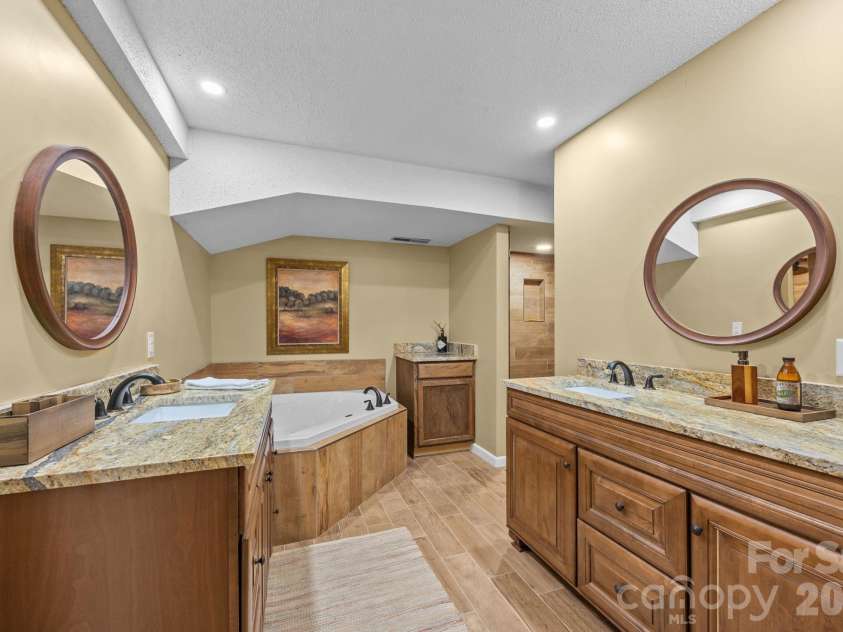 501 Woodfield Drive, Asheville, NC 28803.  MLS# CAR4342330, YatesRealty ID 7007. Ensuite Spa Bathroom