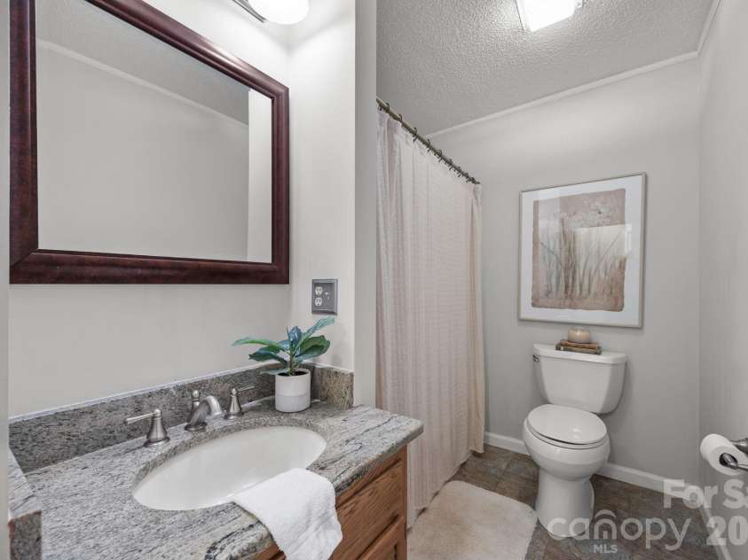 501 Woodfield Drive, Asheville, NC 28803.  MLS# CAR4342330, YatesRealty ID 7007. Guest Bath on Main Level