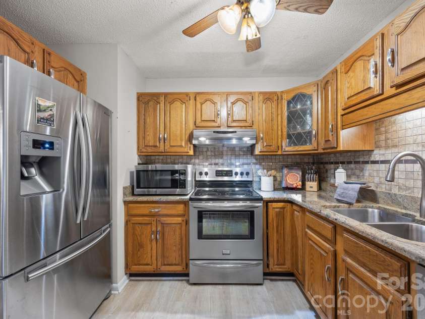 501 Woodfield Drive, Asheville, NC 28803.  MLS# CAR4342330, YatesRealty ID 7007. Kitchen on Main Level
