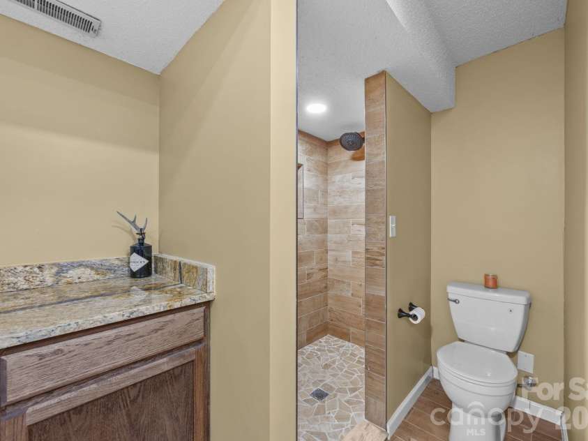 501 Woodfield Drive, Asheville, NC 28803.  MLS# CAR4342330, YatesRealty ID 7007. Tile Shower