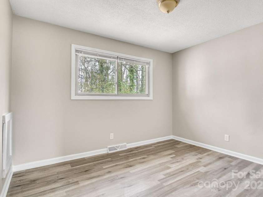 2801 Alleghany Street, Charlotte, NC 28208.  MLS# CAR4239718, YatesRealty ID 7009. First bedroom, immediately walking in.