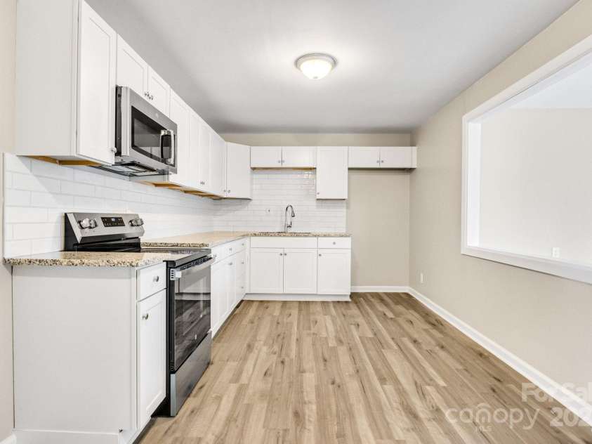2801 Alleghany Street, Charlotte, NC 28208.  MLS# CAR4239718, YatesRealty ID 7009. Full shot of kitchen.